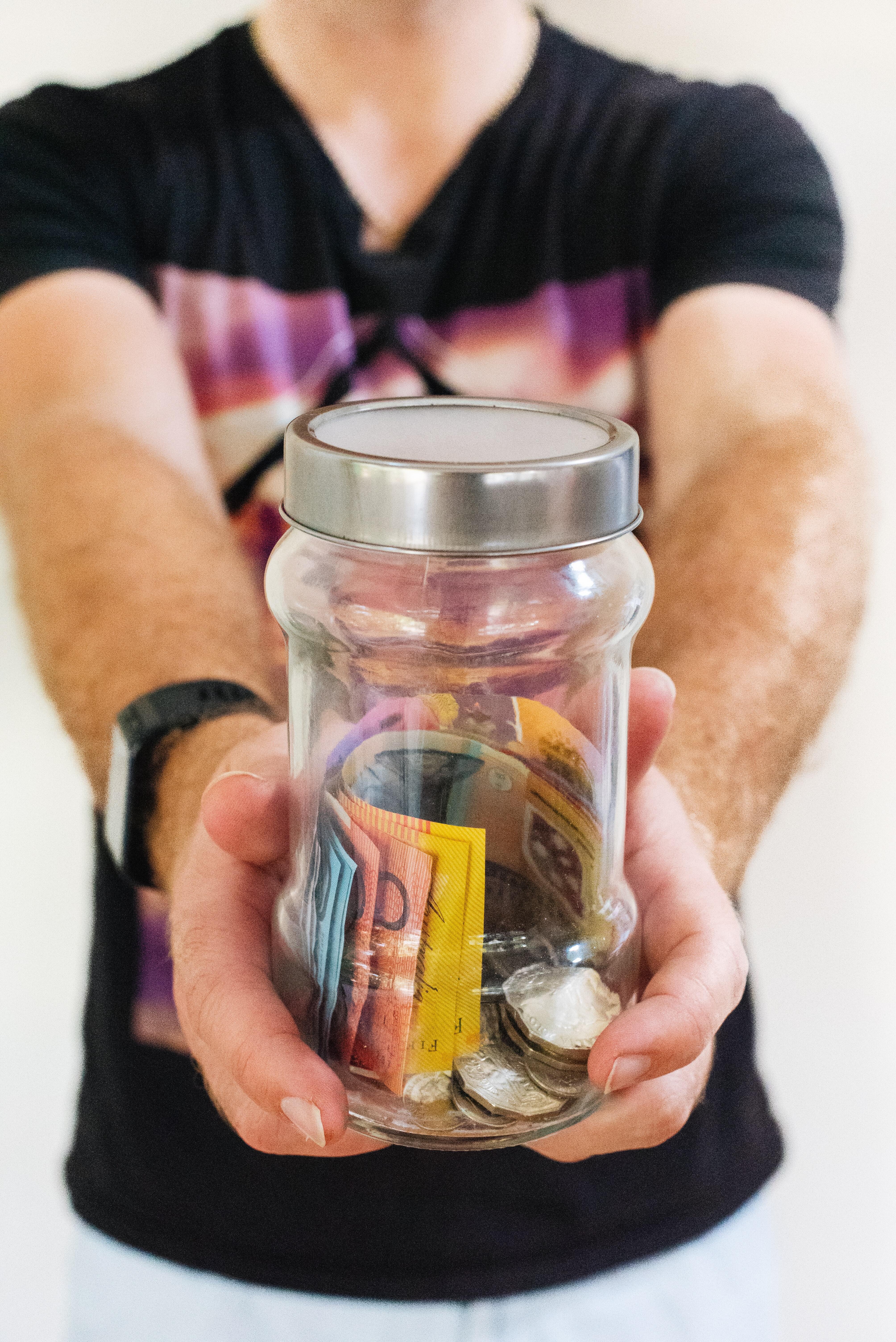 jar full of Australian dollars and coins